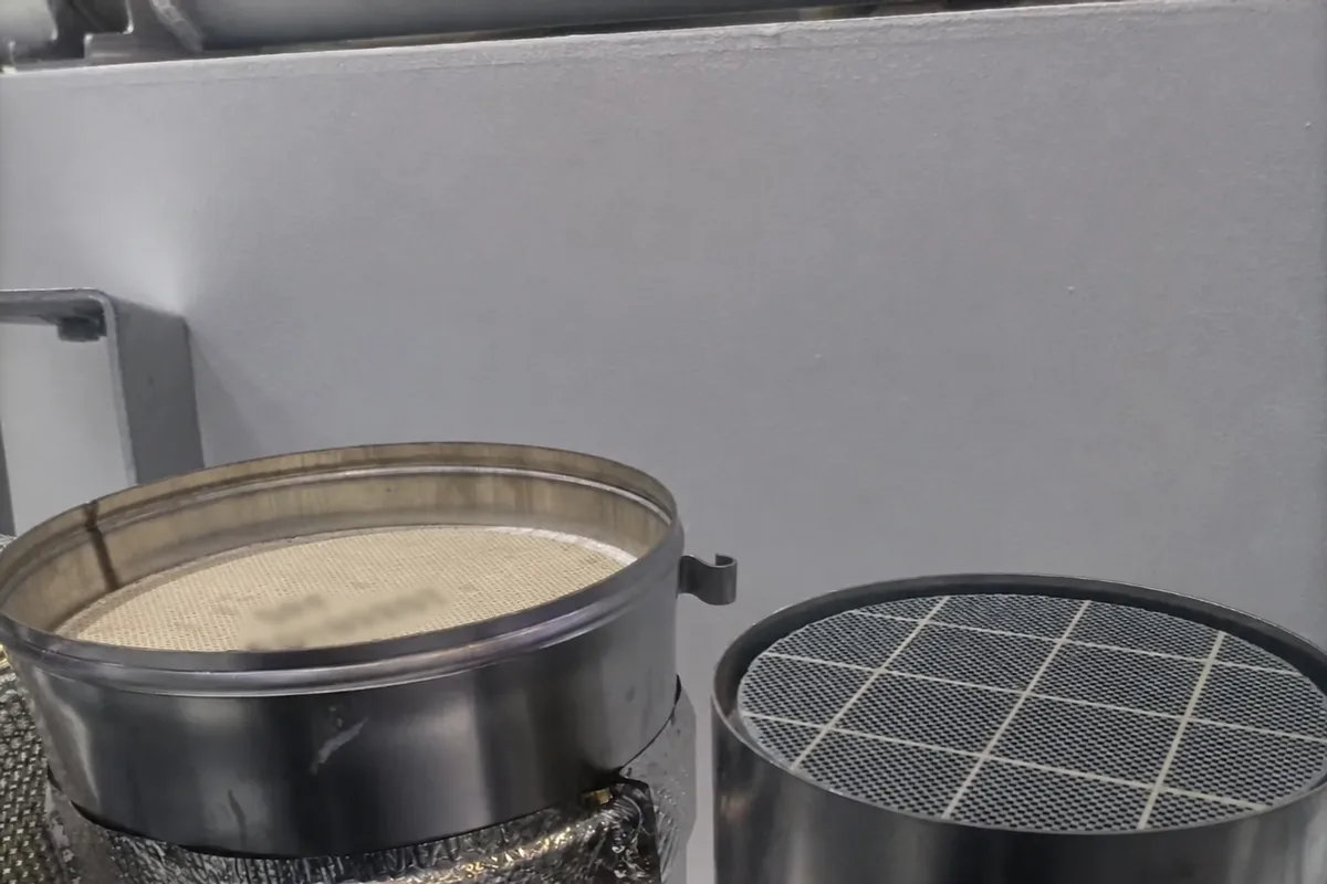 Two metal canister assemblies showing different internal substrate faces