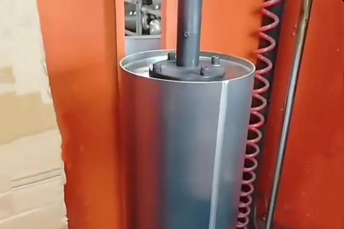 Cylindrical reservoir shell held in production equipment